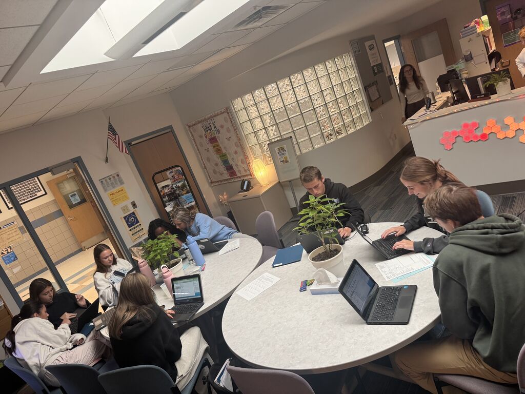 students working on their applications