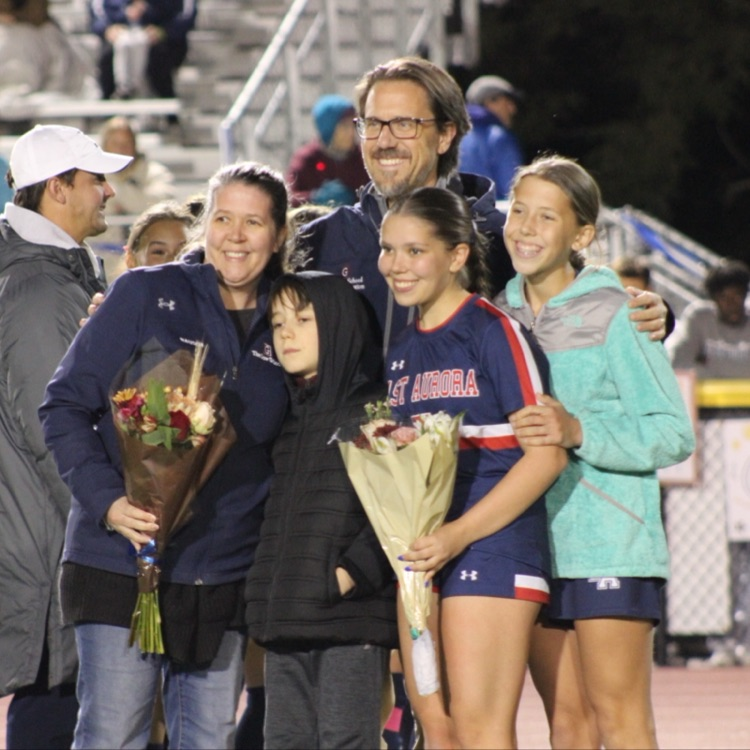 Soccer player with family