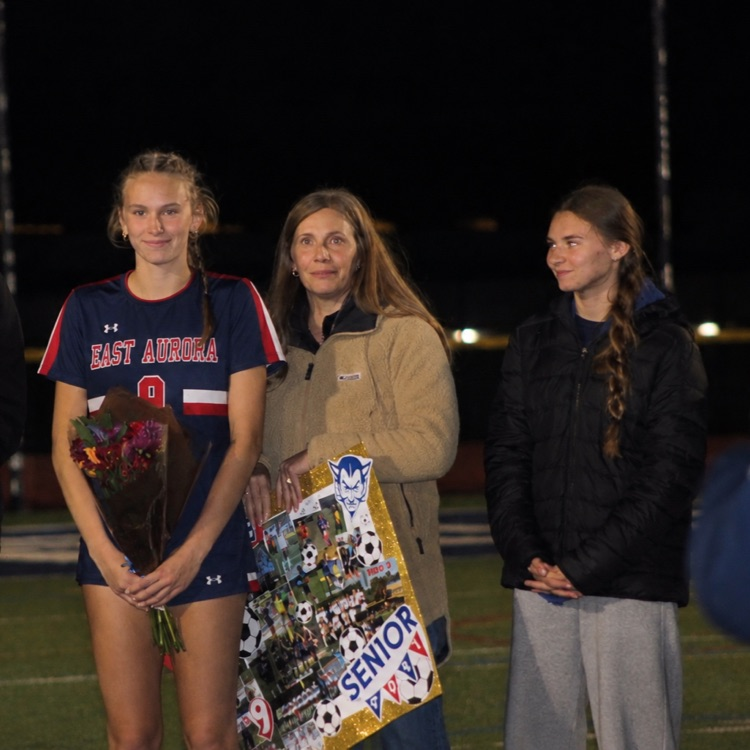 Soccer player with family