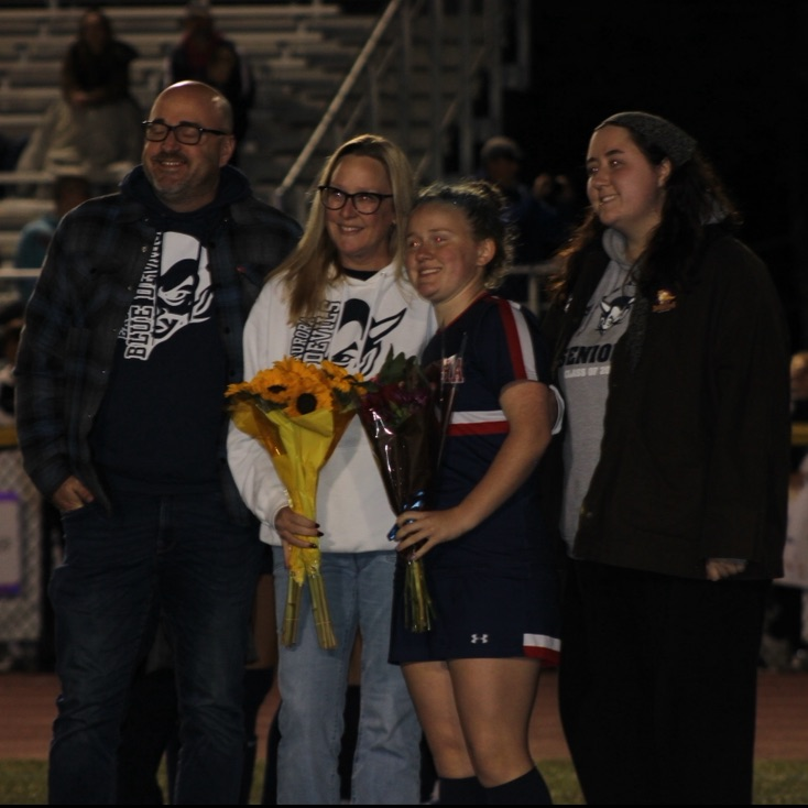 Soccer player with family
