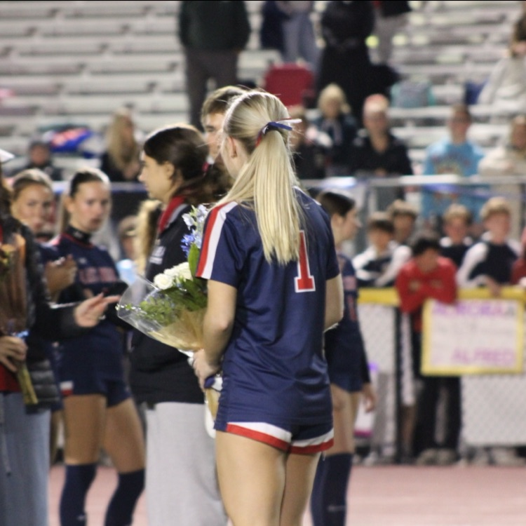 Soccer player at senior night