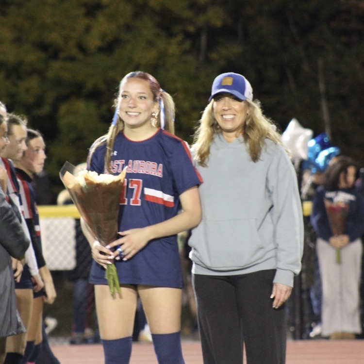 Soccer player with Mom