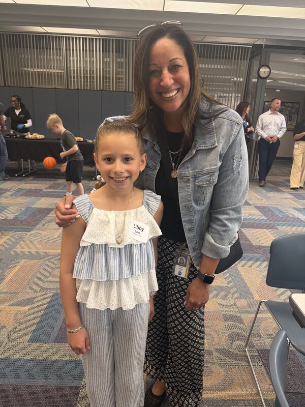 student and Ms. Pantoja posing for a picture