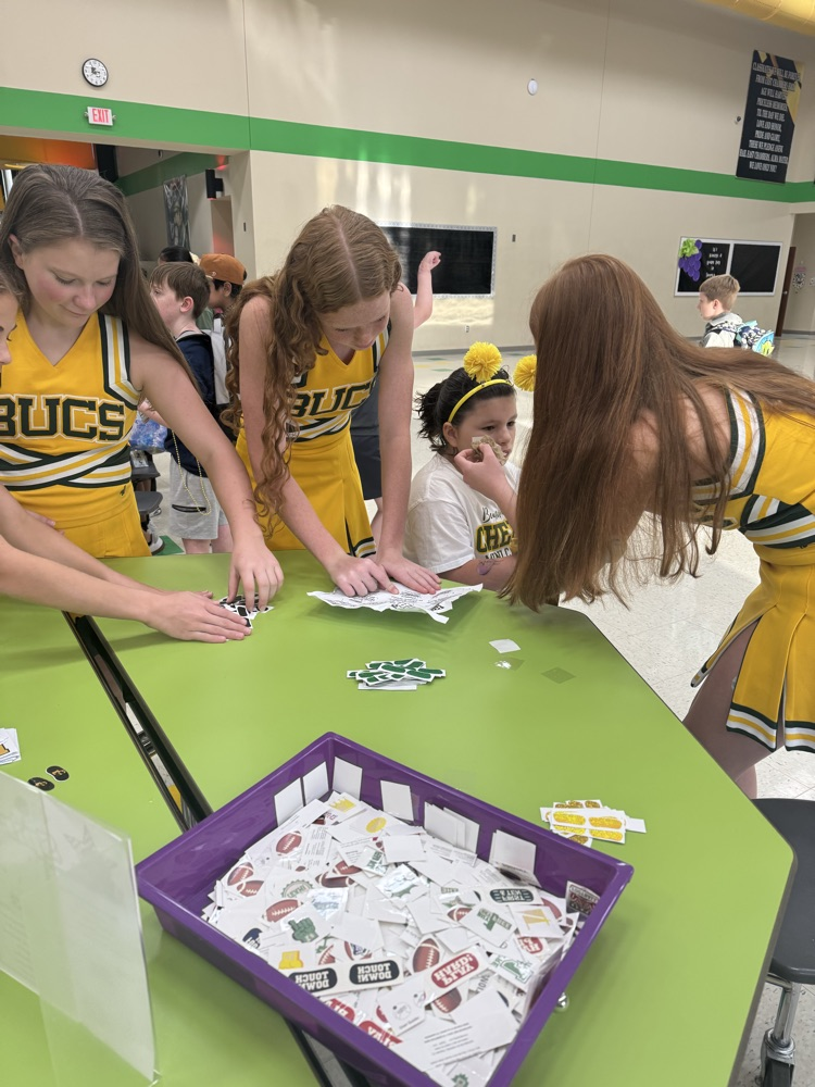 ECJH Cheerleaders helping with PTO Spirit Sales