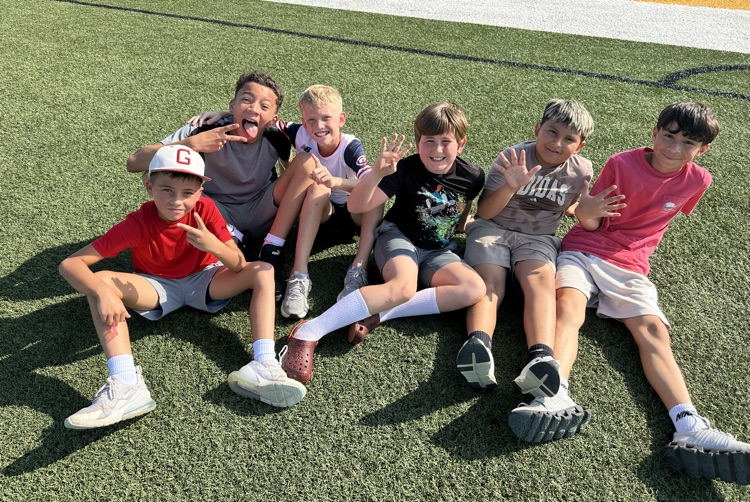5th grade boy relaxing after their run!