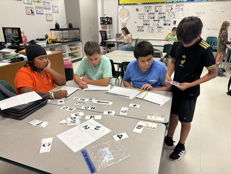 Ms. Hearns class working on balancing equations. 