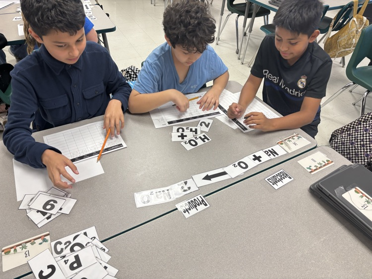 Ms. Hearns class working on balancing equations. 