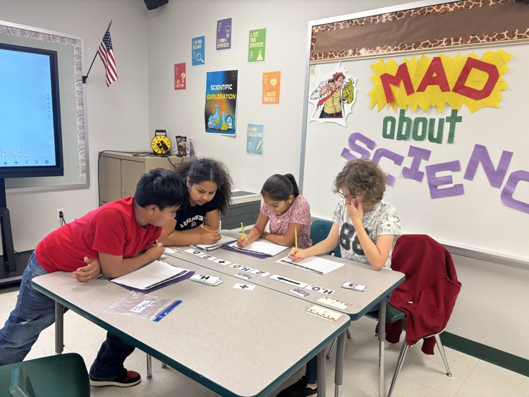 Ms. Hearns class working on balancing equations. 