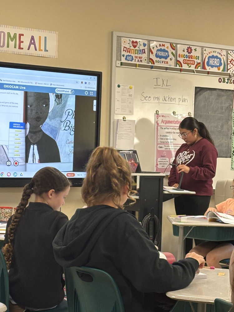 Izabella R. leading a class activity. 