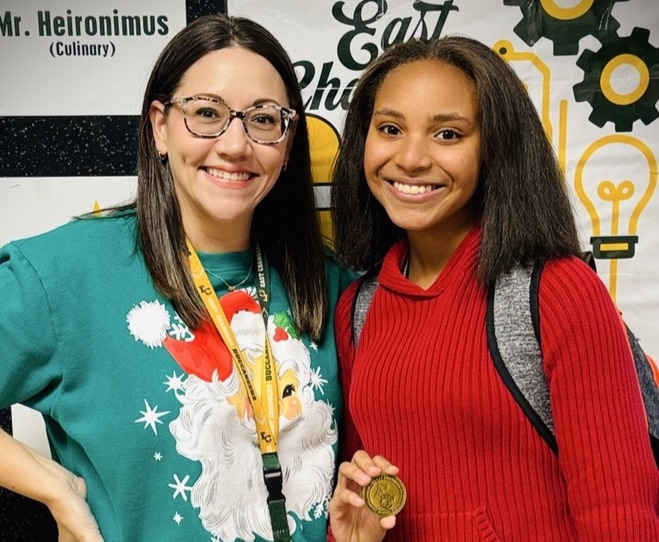 Ryanne White receives Buccaneer Challenge Coin