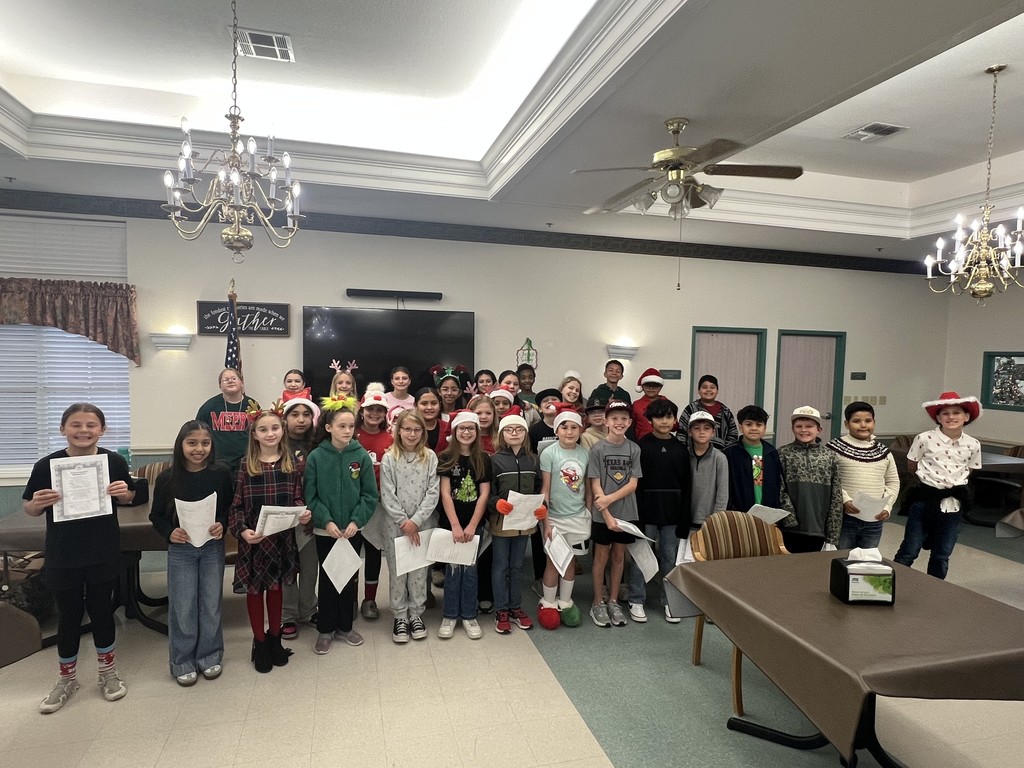 students at Arboretum Christmas Caroling