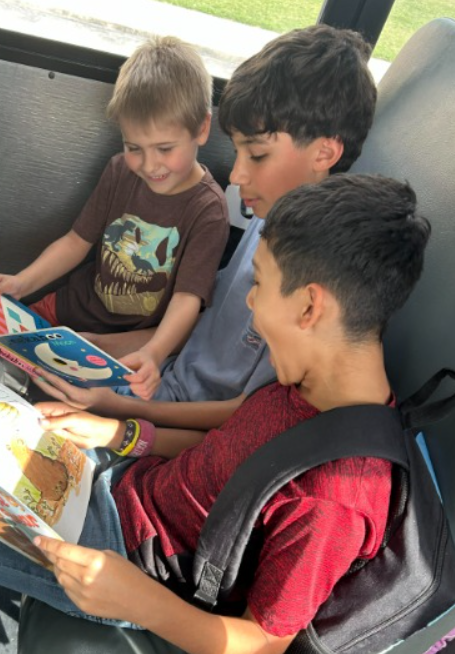 3 students reading