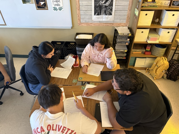 students working on classroom assignments 