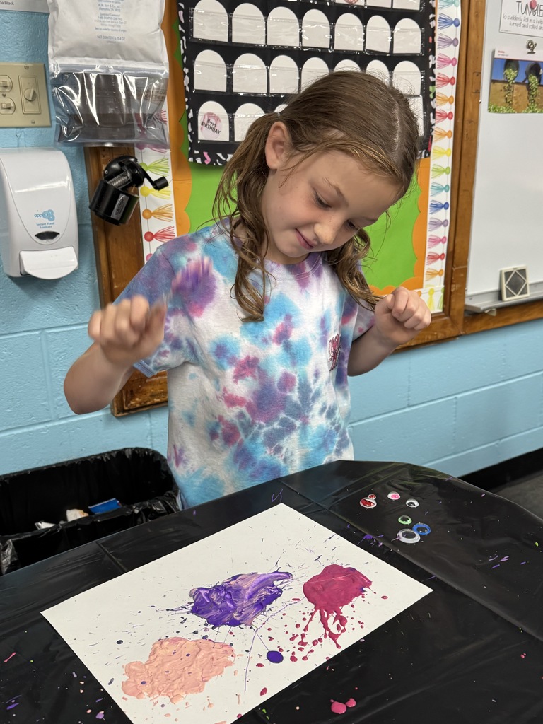 Second grader creating her blob monsters