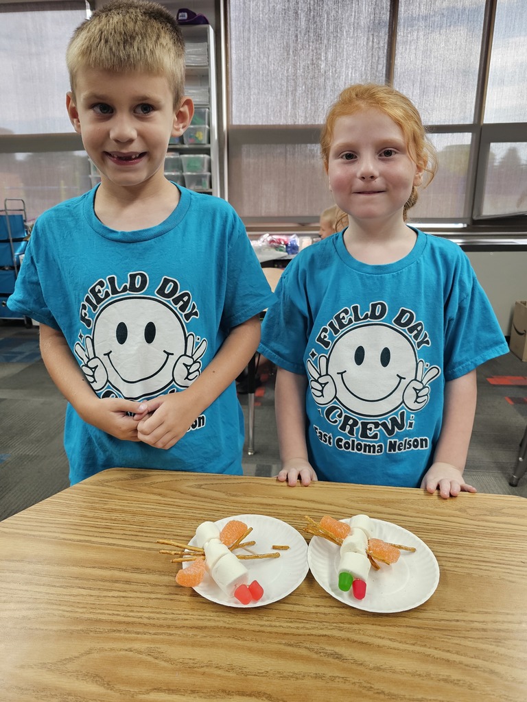 Two students with their insects