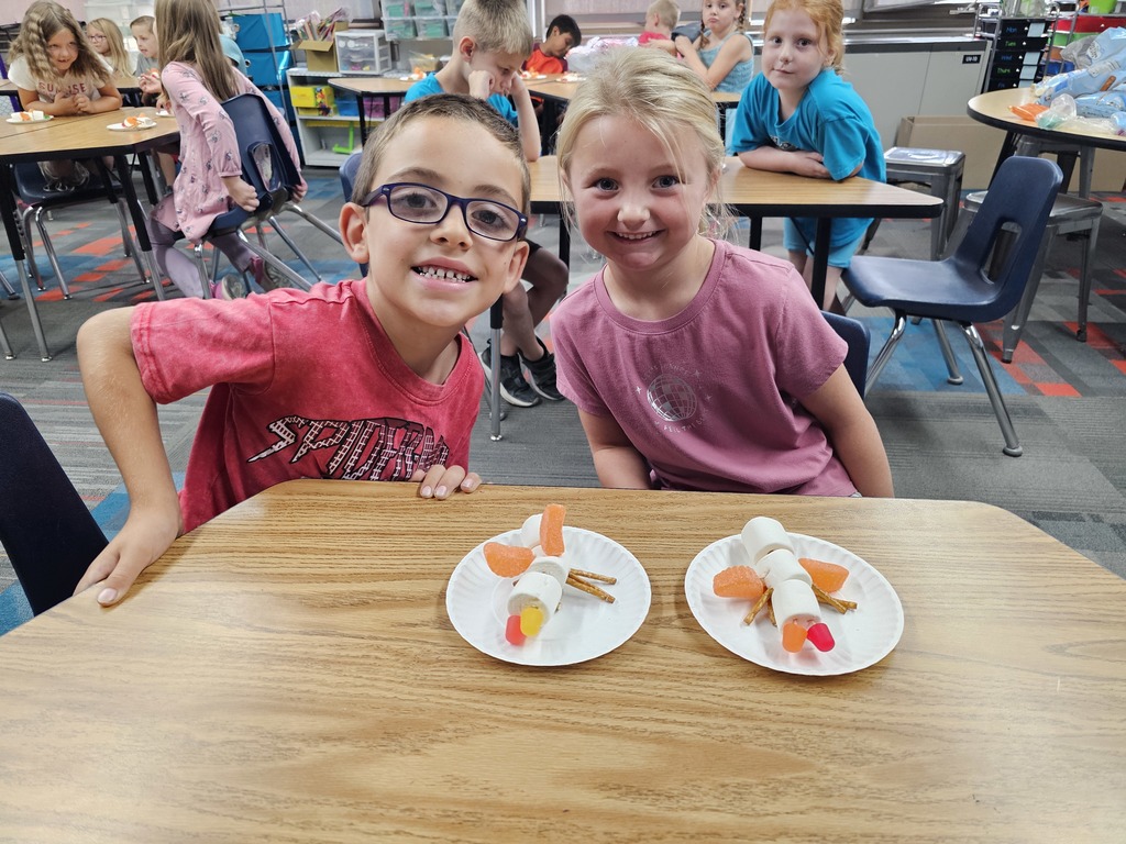 Two students with their insects