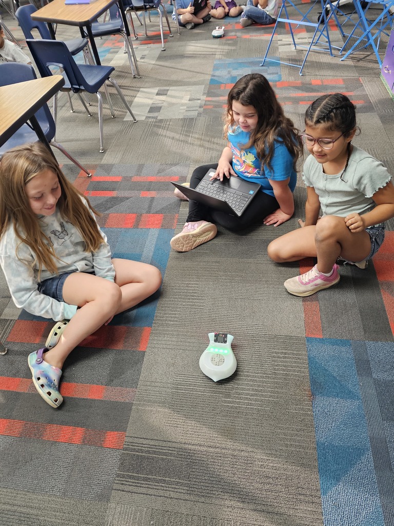 Students watching the Finchbot light up