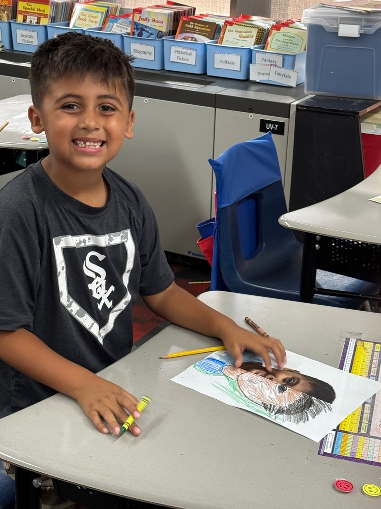 First grader enjoying his art time