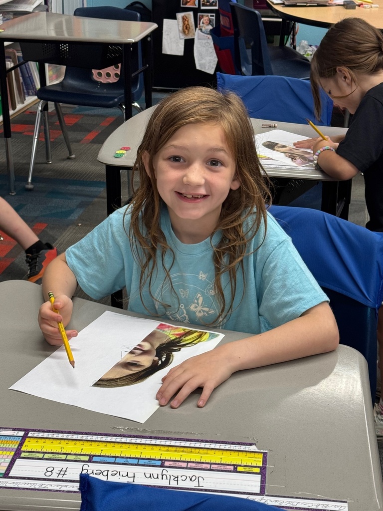 Student working on her portrait