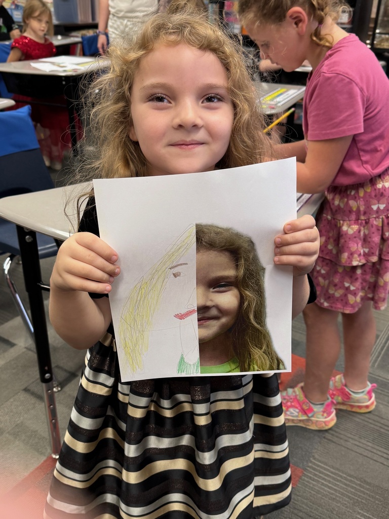 First grader is proud of her work