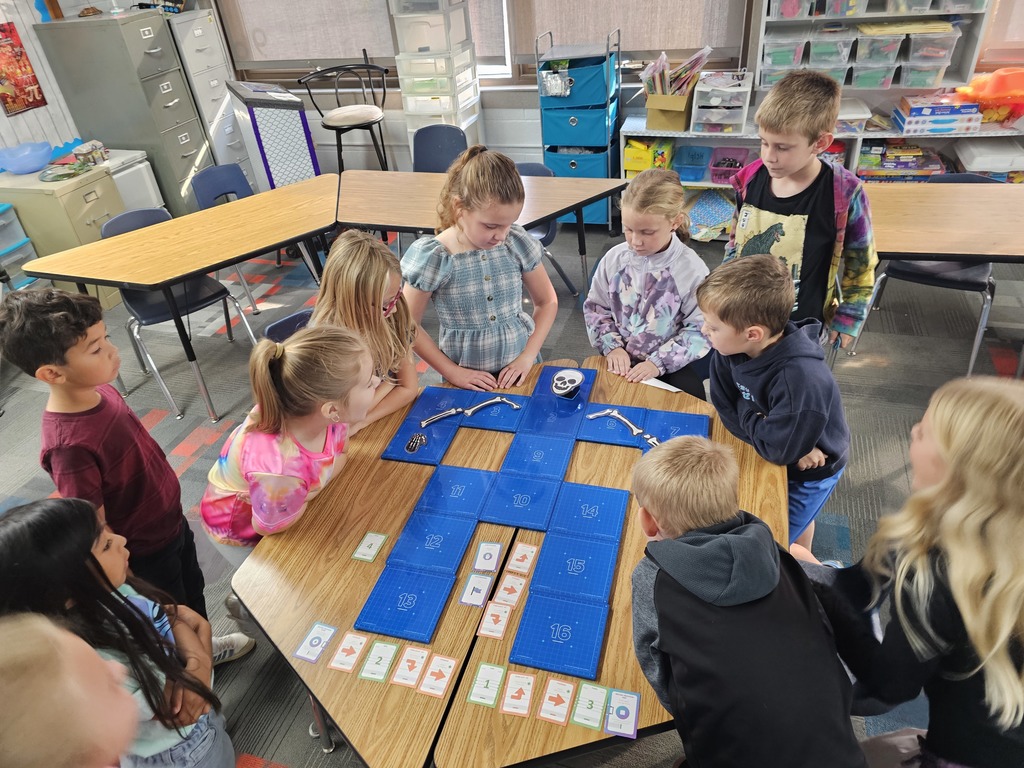 Students watching the Kaibot deliver the skull
