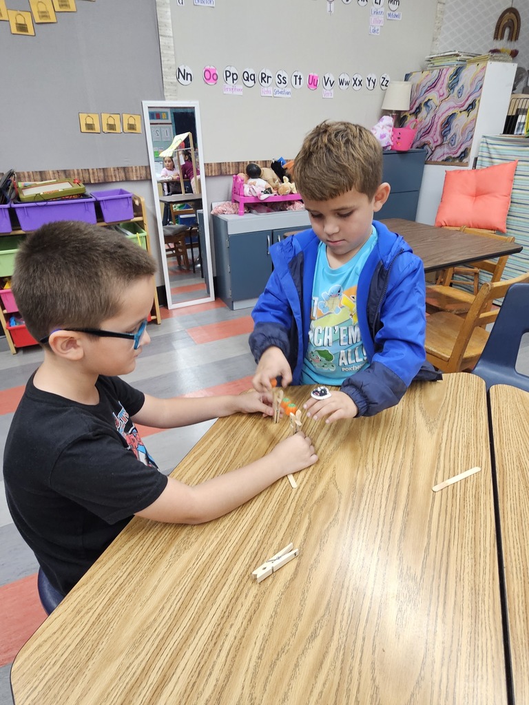 Students working together to build