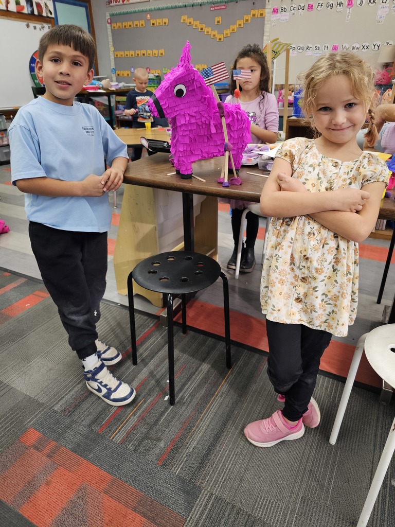Students showing off their flag