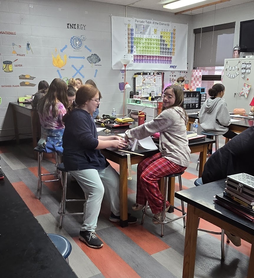 Students working on their table