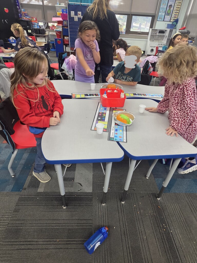 students excited about what is happening to their pumpkin!