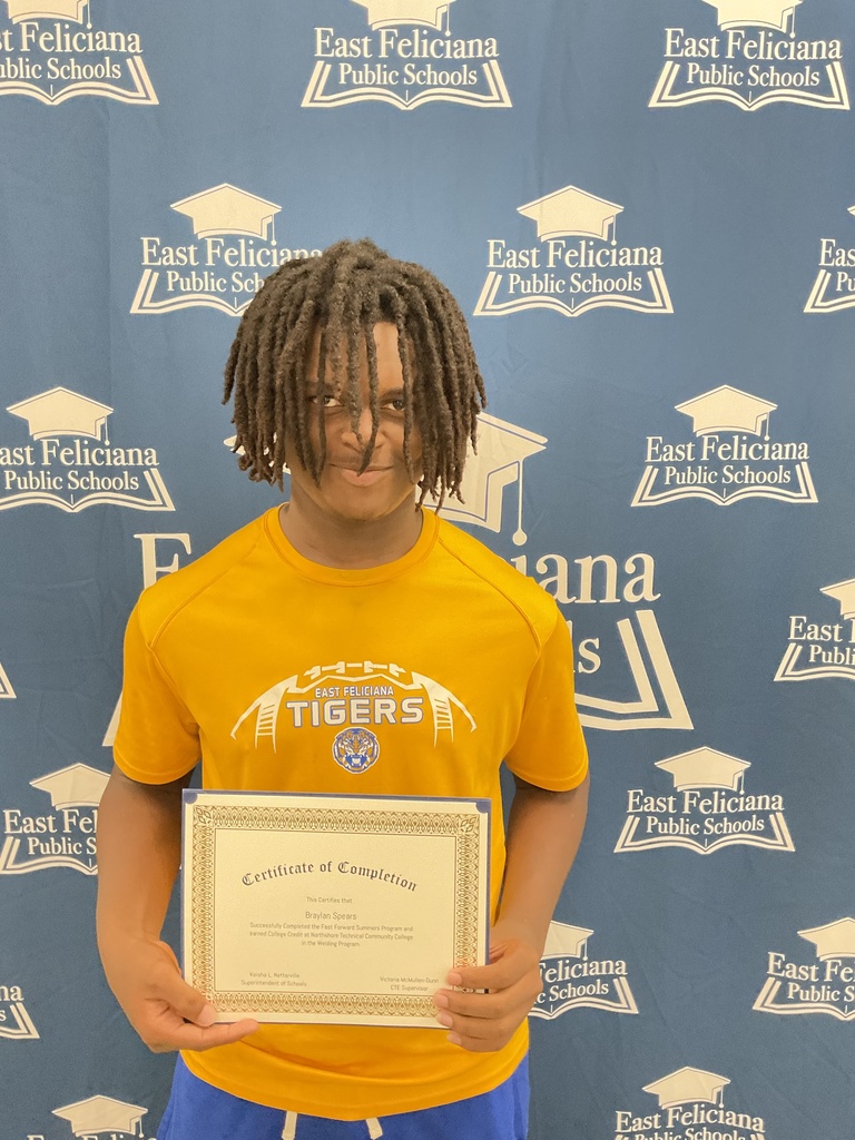Student with certificate