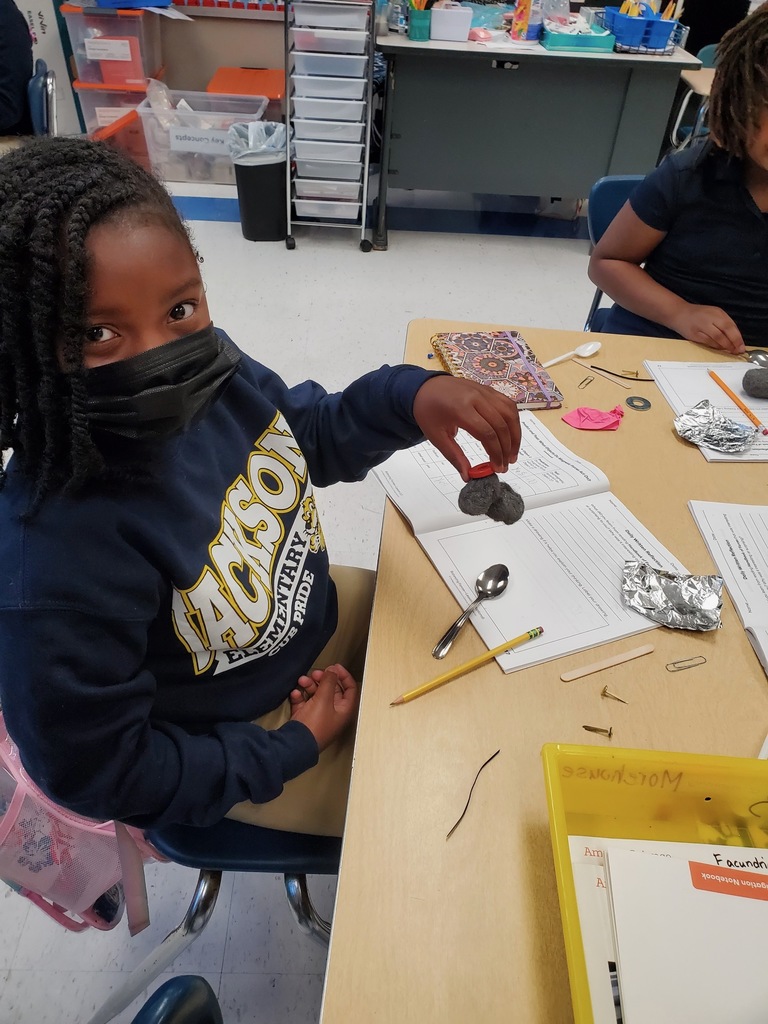 A student works with magnets.
