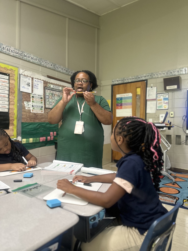Teacher models measuring.