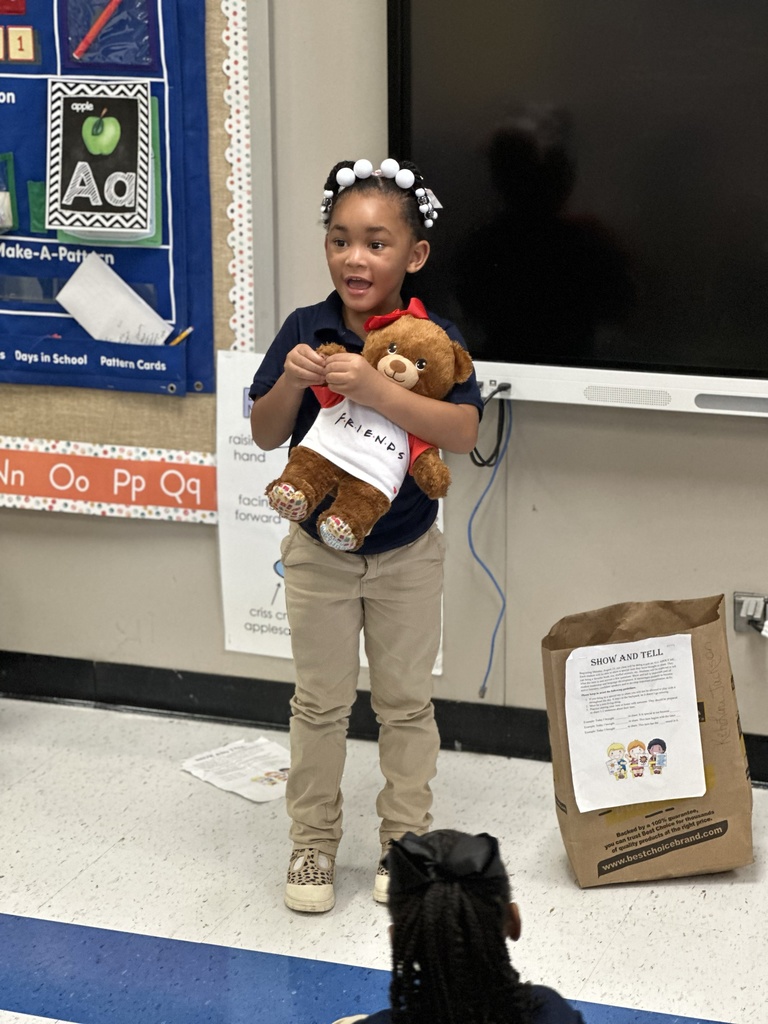 A student shares a teddy.