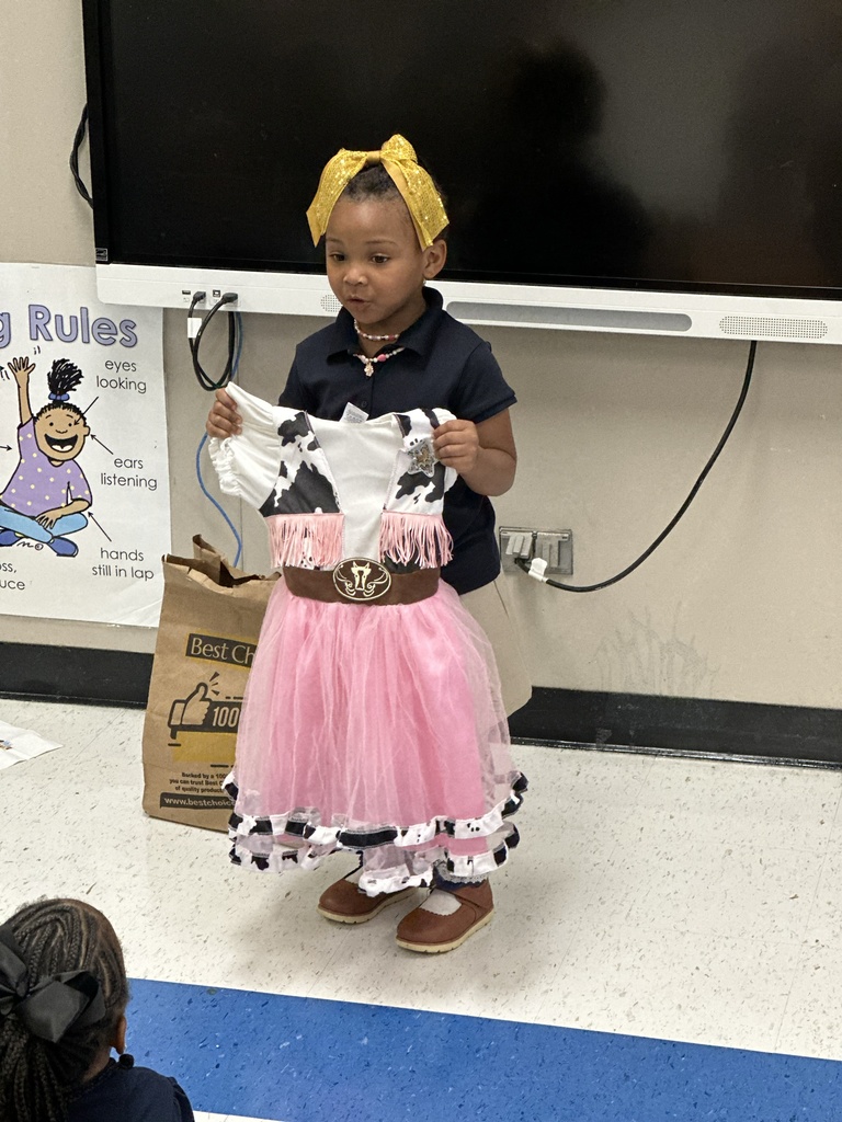 A student shares a dress.