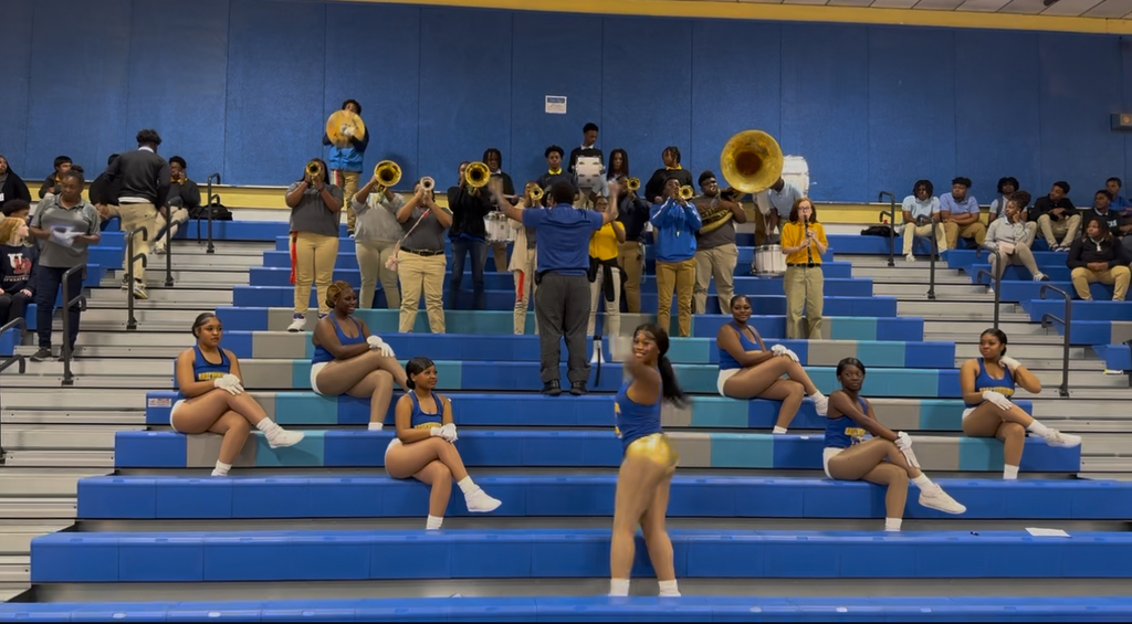 Band playing music in stands.