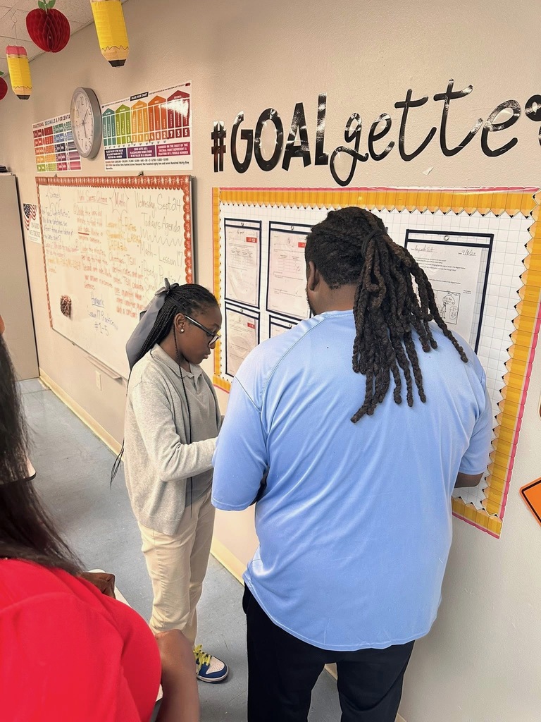 A student shares data with a parent.