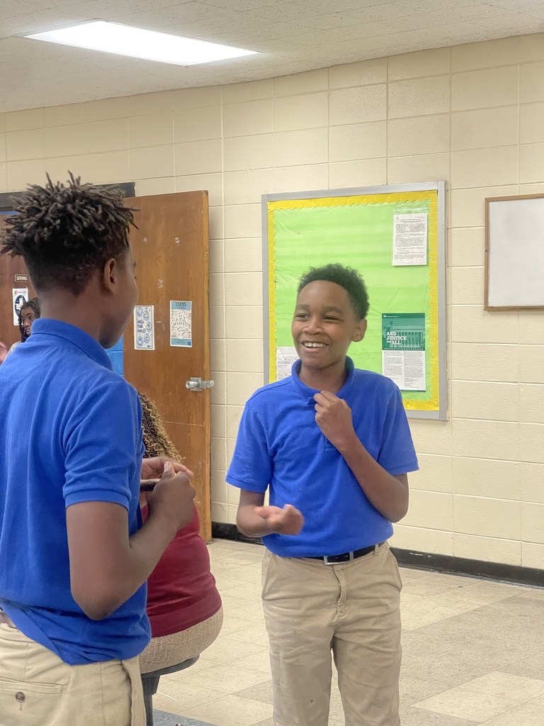 Two students hare compliments.