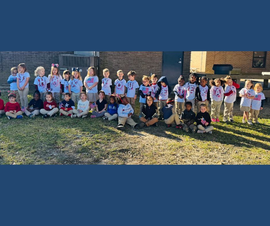 Students in shirts that spell out "Thank you veterans."