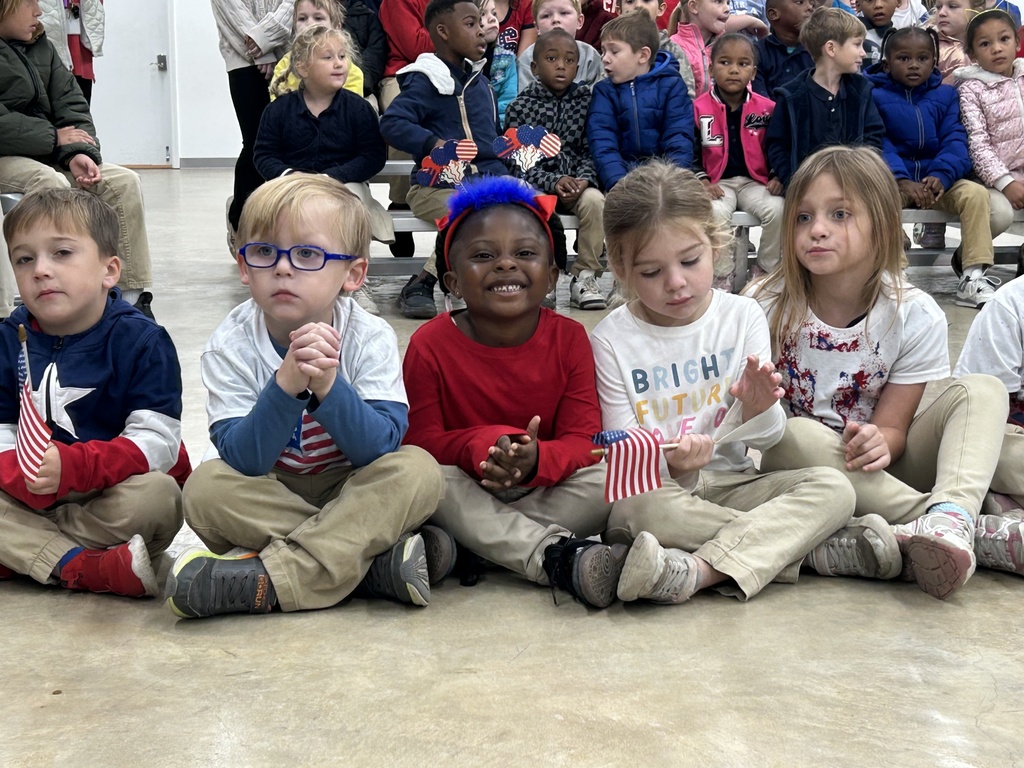 A smiling group of students.