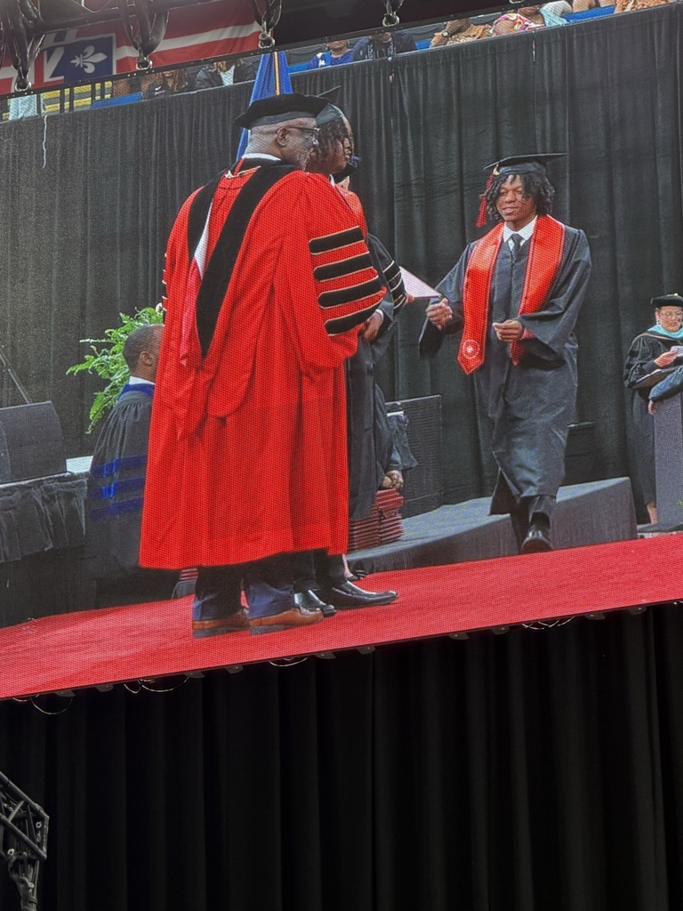 Student receiving a diploma.