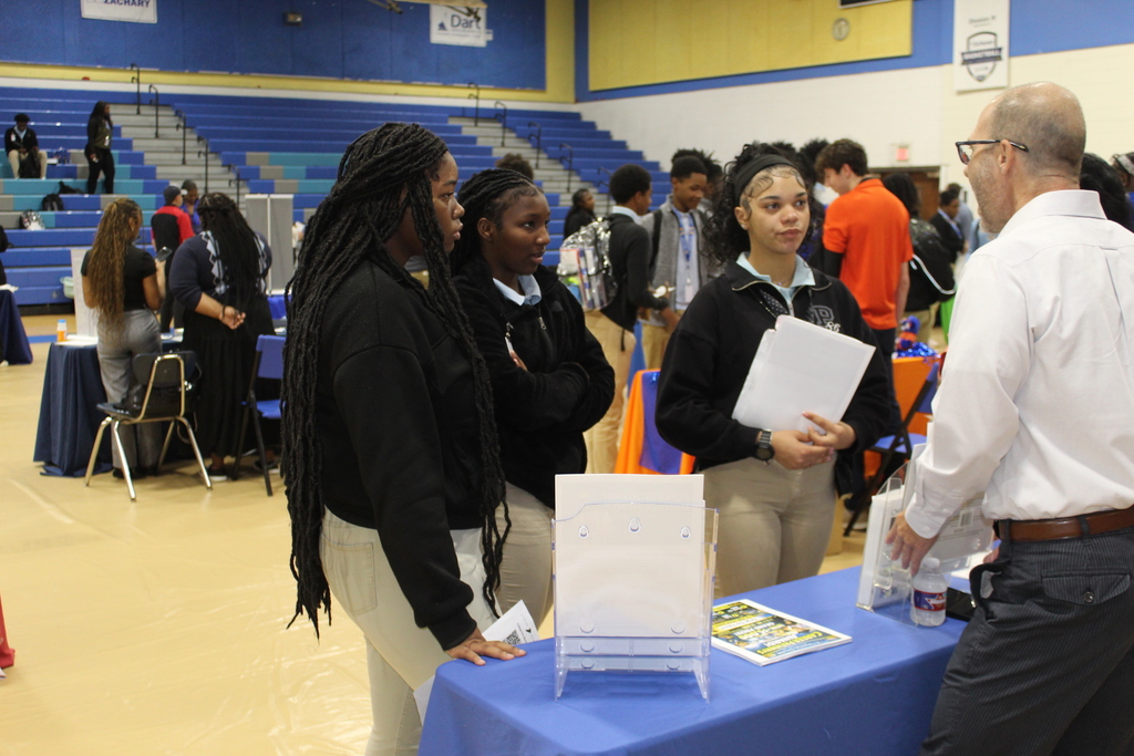 Students talk to a recruiter.