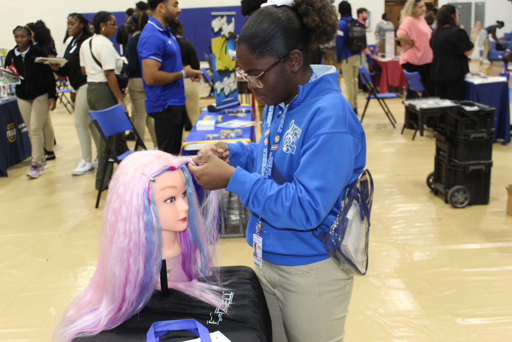 Student works on hair.