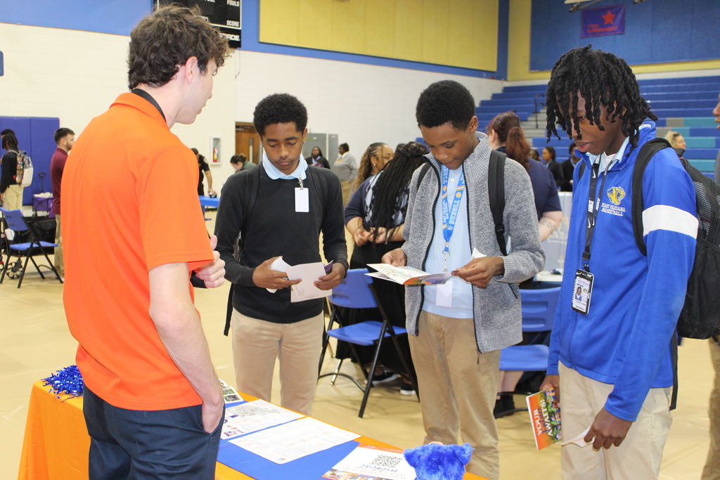 Students talk to a recruiter.
