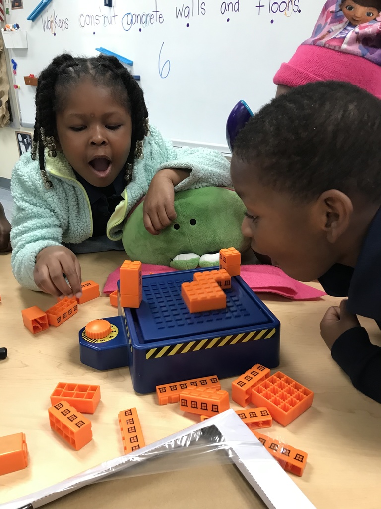 Students work on a construction.