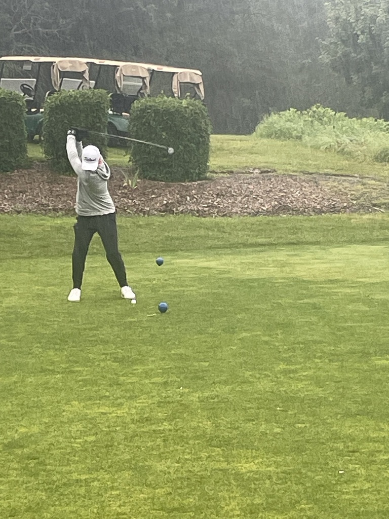Even the pouring rain can’t break Myles’ focus on his first drive of the day. 
