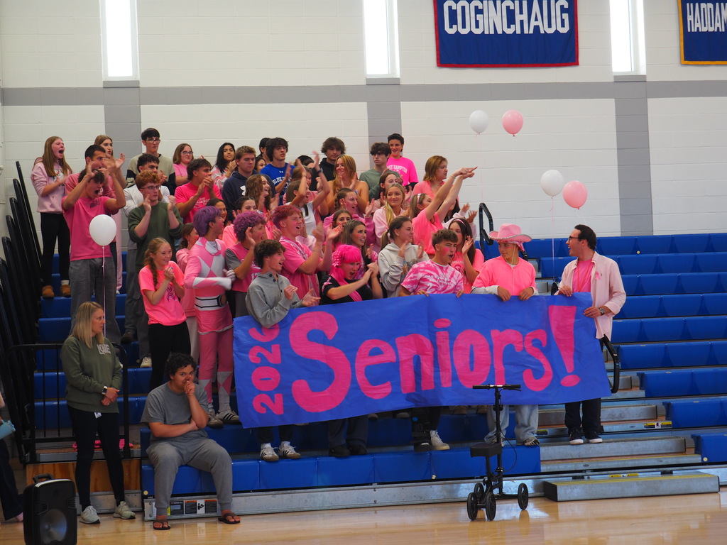 Seniors with sign