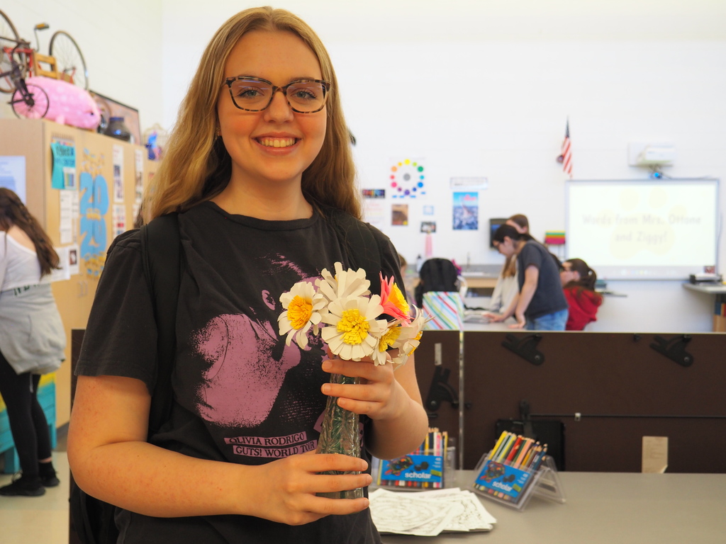 just completed Paper Flower Bouquet held by student