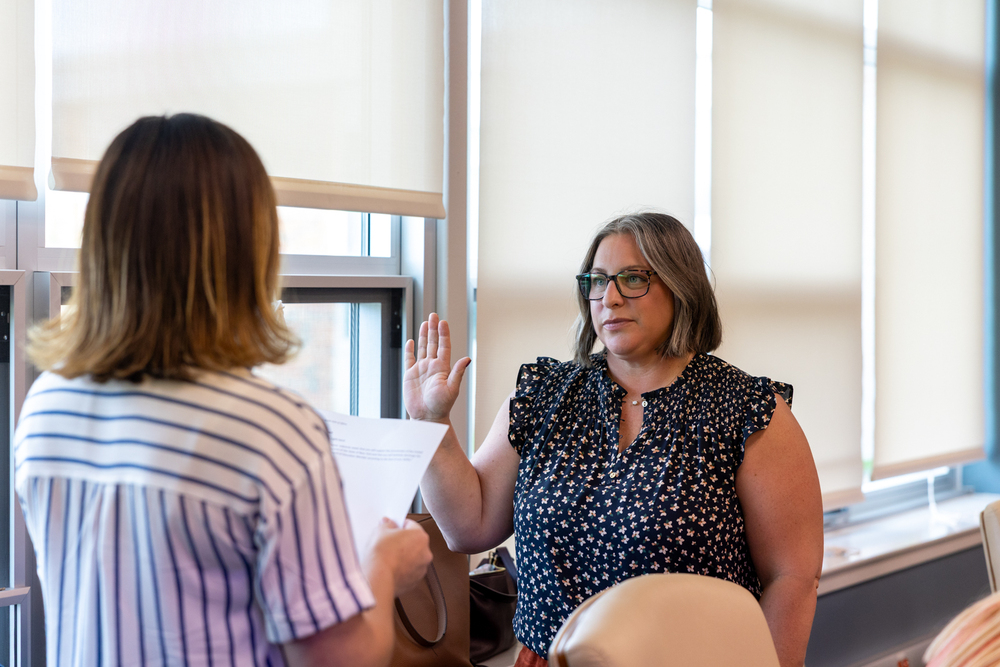 Elena Matthews being sworn in by the district clerk