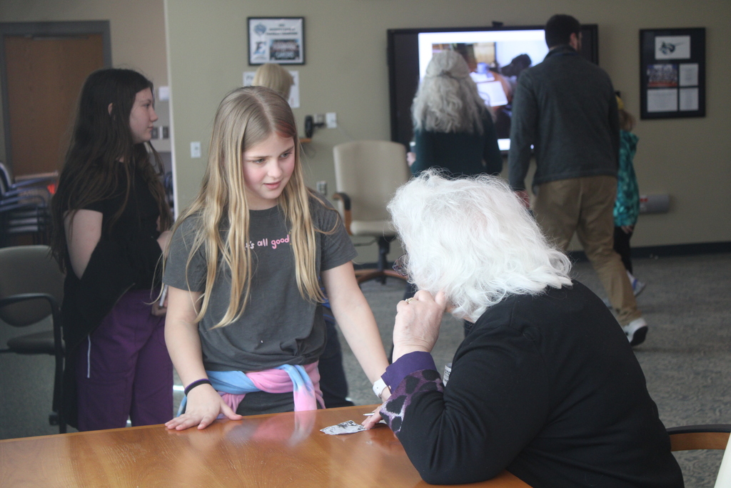 students getting book signed