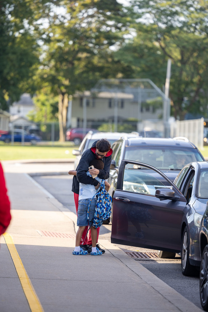 students arriving at Durand